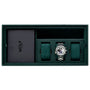 Green leather watch winder safe with four compartments holding a silver chronograph watch and three green cushioned slots.