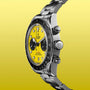 Tudor Black Bay Chrono stainless steel watch with yellow dial, black subdials, and tachymetric bezel.
