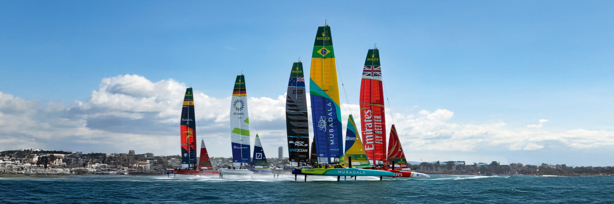 Five sail boats competing in the SailGP race